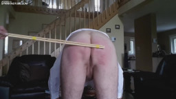 Bad boy caned down to the bare arse