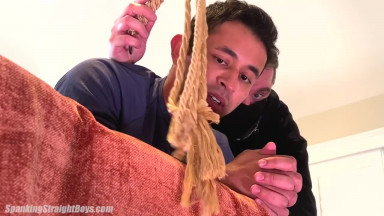 A Very Muscular Young Man is Spanked and Flogged